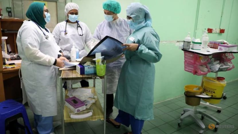 health workers wearing protective suits work at emergency department in the kuala lumpur hospital
