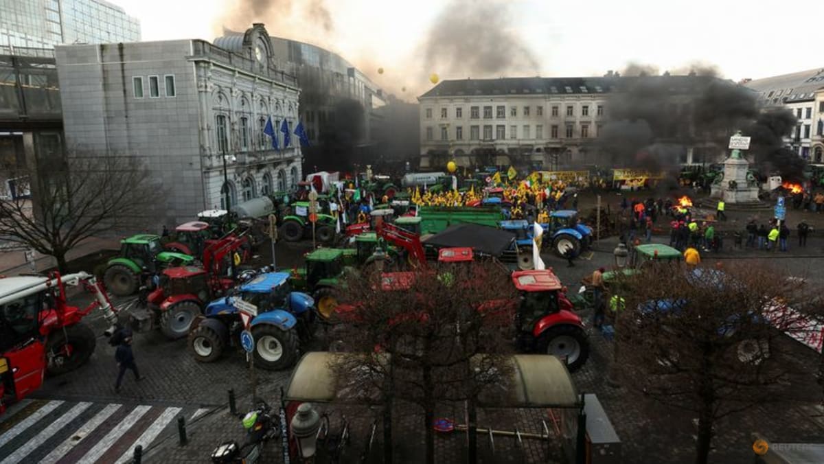 Farmers set fires and attack barriers near EU summit as anger spreads - Vimarsana News