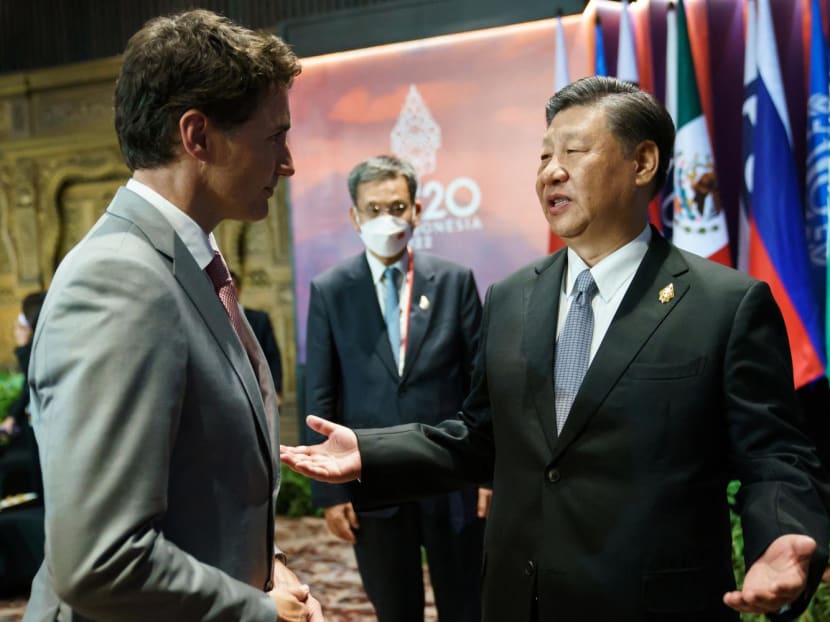 Canada's Prime Minister Justin Trudeau speaks with China's President Xi Jinping at the G20 Leaders' Summit in Bali, Indonesia, Nov 16, 2022. 