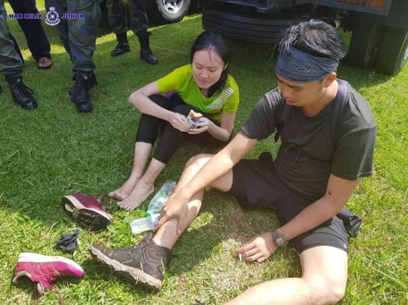 Ms Lum Jie and Mr Tan Chang Xiang, Dominick were rescued by the Malaysian authorities on Thursday (Feb 8), three days after they first went missing in Johor's Gunung Pulai forest reserve. Photo: Polis Johor via Facebook
