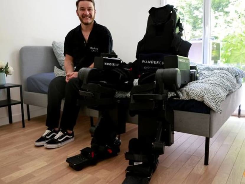 Father builds exoskeleton to help wheelchair-bound son walk