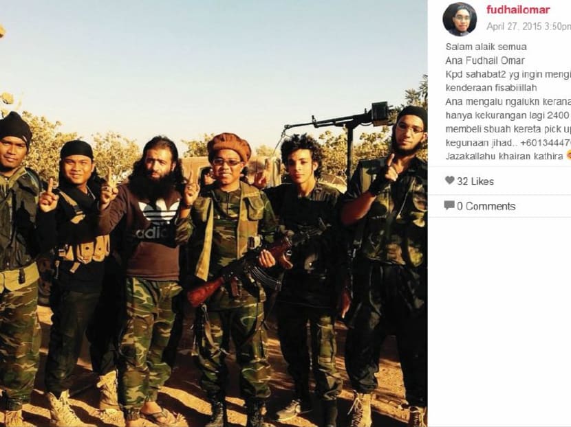 Known as Abu Qutaibah among his comrades, Muhammad Fudhail Omar (third from right) actively disseminating IS ideology and recruiting new militants via social media.