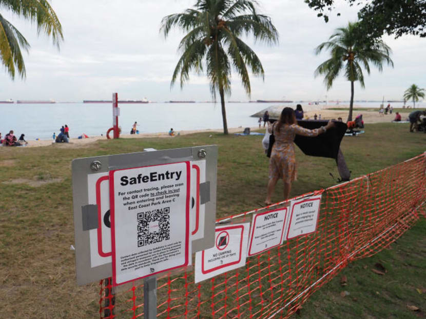 A total of 57 individuals have been fined S$300 each for breaking safety rules, including a group of 13 people who booked several barbeque pits at East Coast Park.