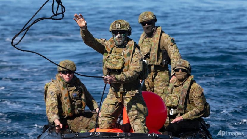 Australian navy ship tows unexploded bomb out to sea Australian navy ship tows unexploded bomb out to sea