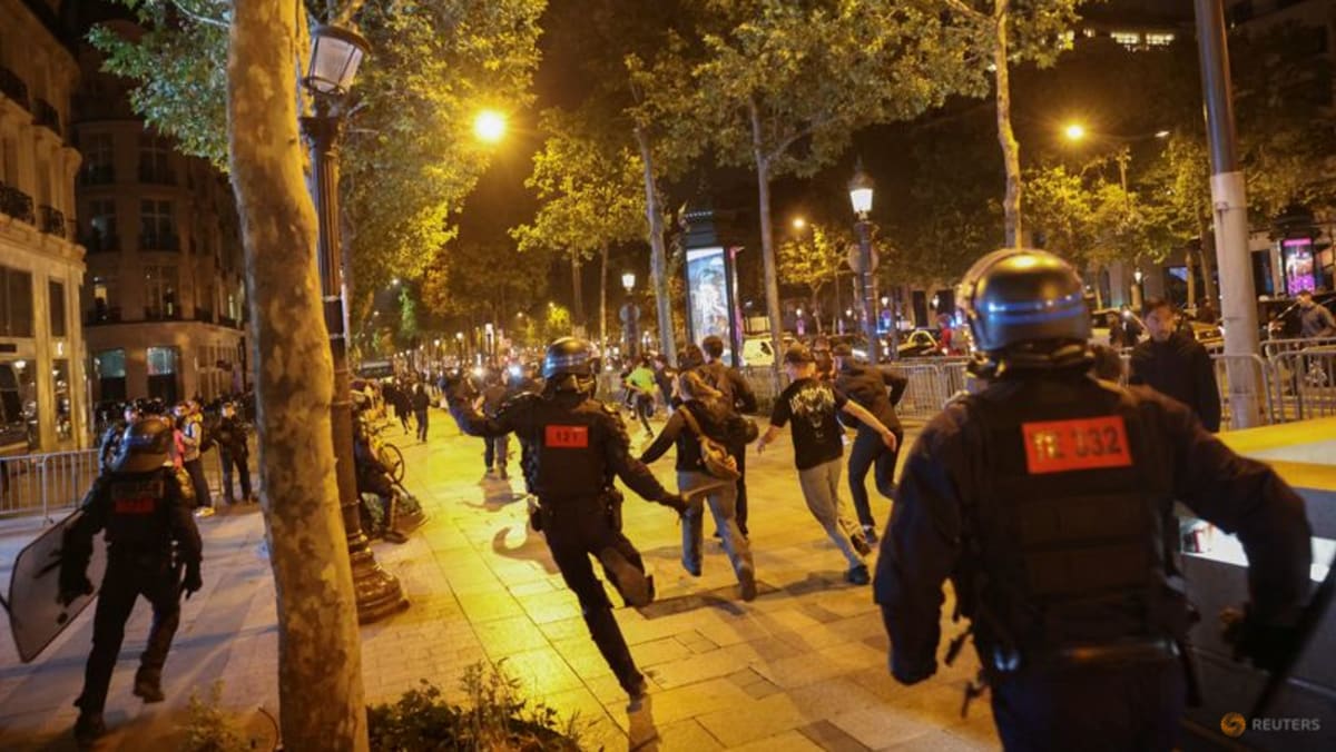 French riots an unwelcome, perilous crisis for Macron