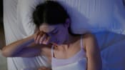 woman sleeping istock 1395450521