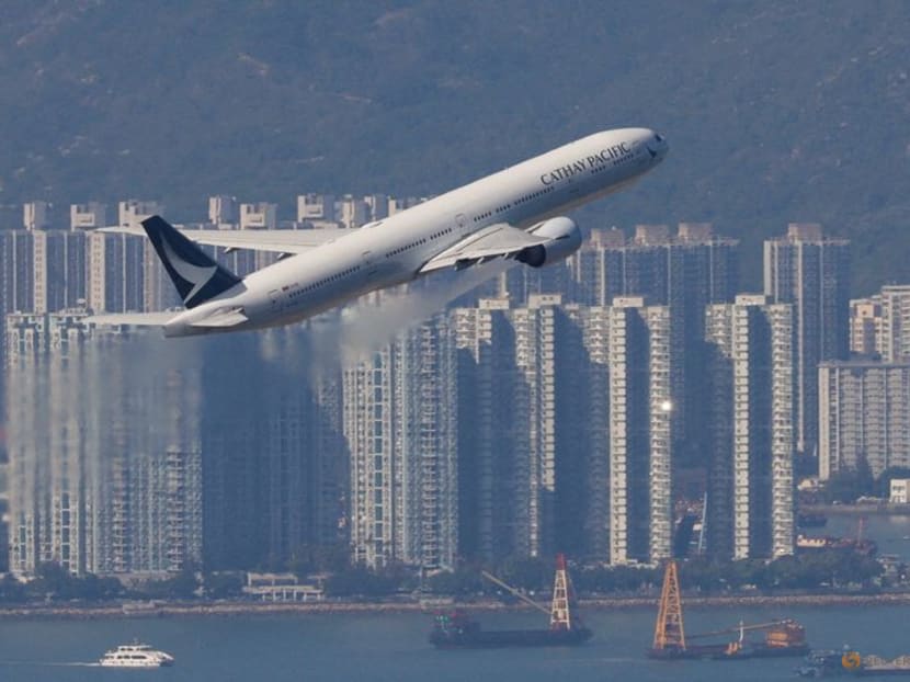 A Cathay Pacific aircraft takes off at the airport, during the coronavirus disease (Covid-19) pandemic in Hong Kong, China, March 31, 2022.