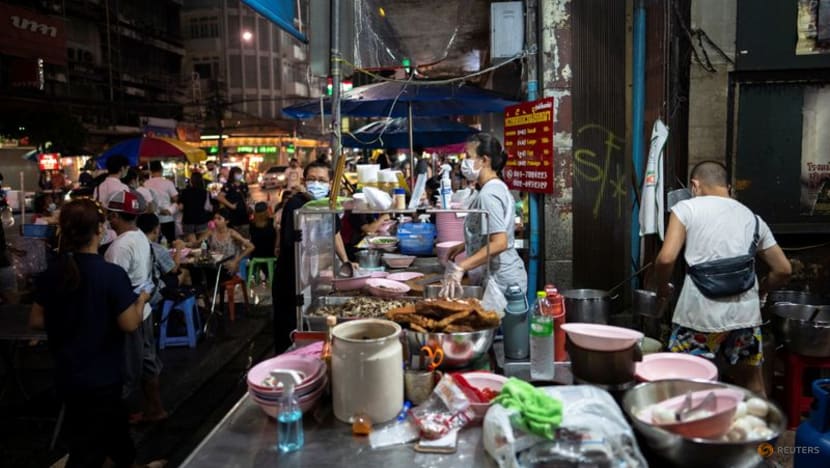 Heirs step up as COVID-19 deaths rock Bangkok's famous street-food stalls