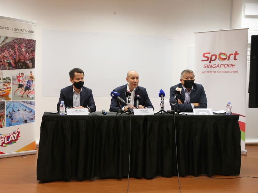 From left: Sports Hub Pte Ltd's chief executive officer Lionel Yeo, Sport Singapore's chairman Kon Yin Tong and Sport Singapore's chief executive officer Lim Teck Yin at at a press conference on June 10, 2022.&nbsp;