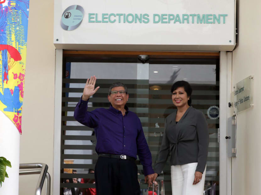 Mr Marican and his wife, Madam Sapiyah Abu Bakar, submitting his application forms for the upcoming Presidential Elections at the Elections Department building on Wednesday (Aug 23). Photo: Nuria Ling/TODAY
