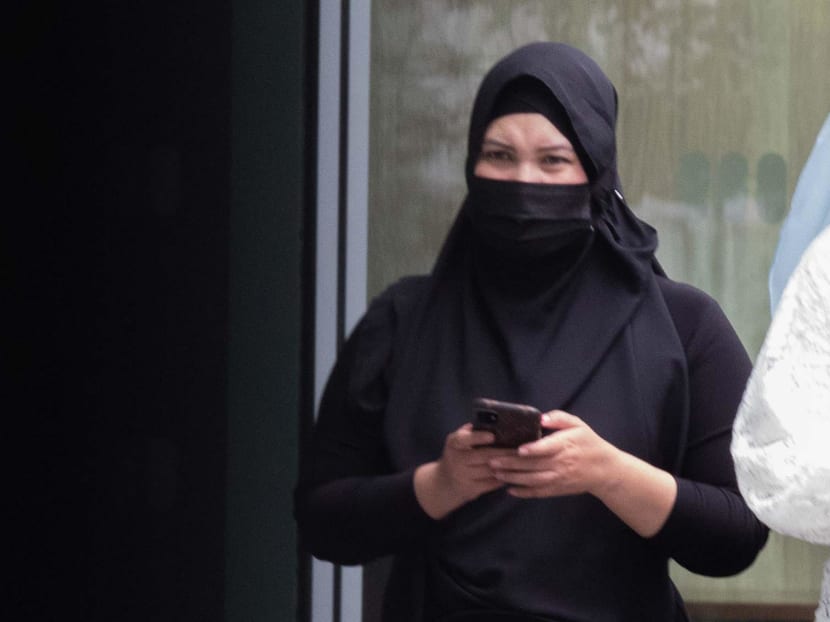 Maslinda Zainal arriving at the State Courts on Jan 11, 2021. Maslinda Zainal arriving at the State Courts on Jan 11, 2021.
