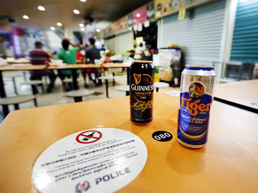 Hawkers at Tekka Food Centre said the large groups of drinkers gathered there could just start earlier to get around the 6pm cutoff on Sundays. Photo: Ernest Chua