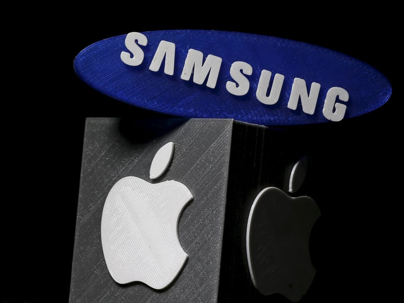 3D-printed Samsung and Apple logos are seen in this picture illustration made in Zenica, Bosnia and Herzegovina on January 26, 2016. Photo; Reuters