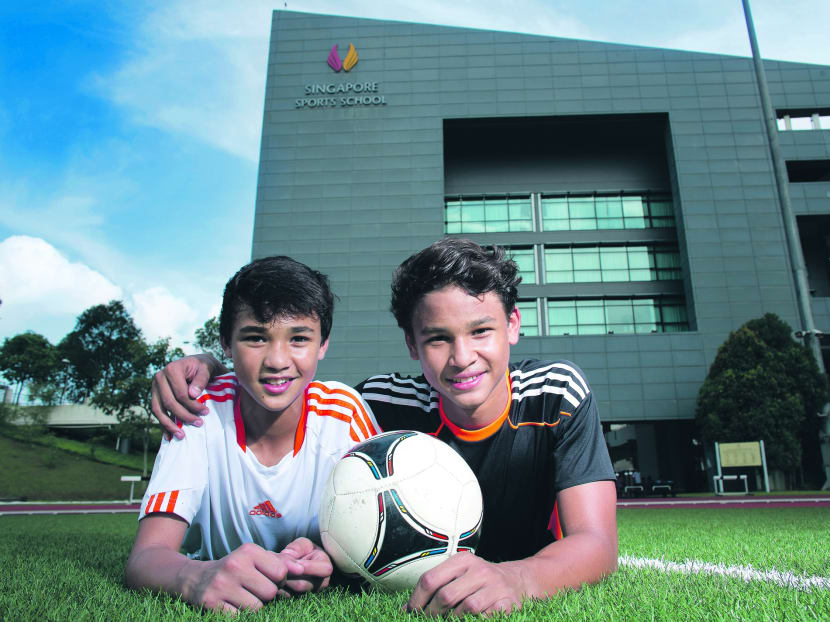 Ikhsan (left) and Irfan will get an early taste of life as national footballers. PHOTO: Singapore Sports School