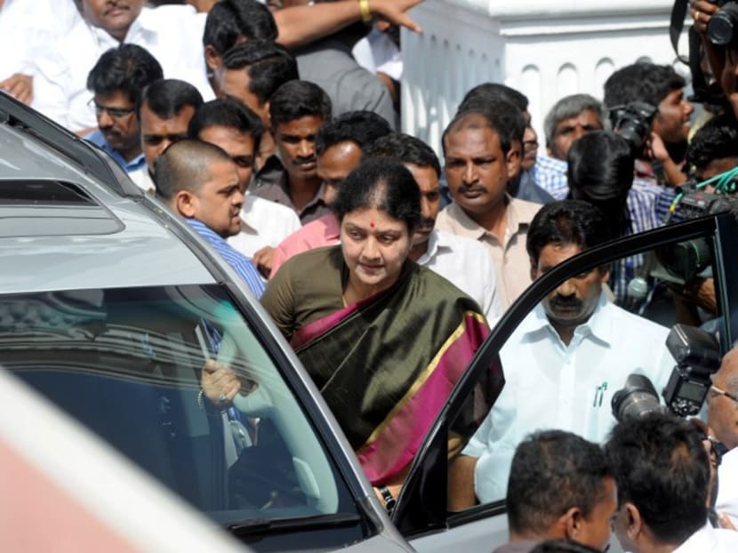 General secretary of southern Tamil Nadu state's ruling All India Anna Dravida Munnetra Kazhagam (AIADMK), VK Sasikala (C) arrives to take up office at the AIADMK headquarters in Chennai on Dec 31, 2016. Photo: AFP