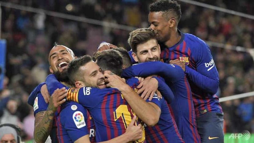 Football: Barcelona hit Sevilla for six to book semi-final place Football: Barcelona hit Sevilla for six to book semi-final place