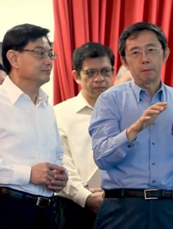 Sim Wong Hoo (right) with Deputy Prime Minister Heng Swee Keat (left) at a demonstration of Creative Technology's Super X-Fi technology in 2019.
