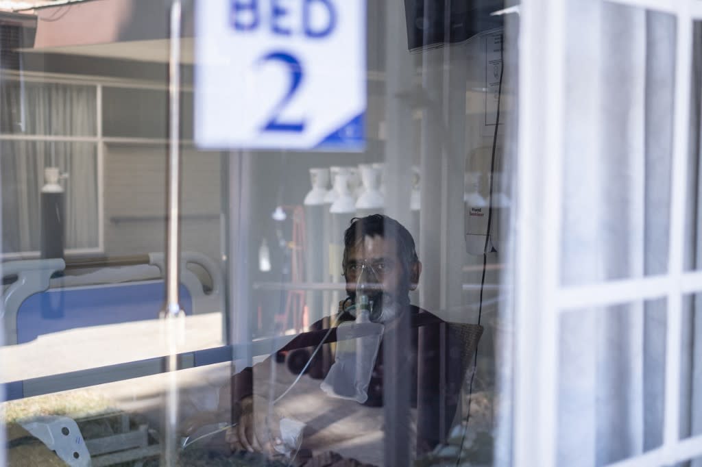 A patient looks on in a non-profit Covid-19 care facility in Norwood, Johannesburg on July 12, 2021.