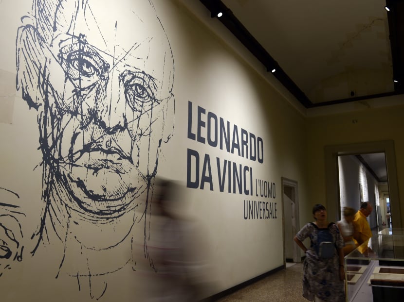 People visit an exhibition of drawings by Leonardo da Vinci, on August 29, 2013 in Venice. AFP file photo