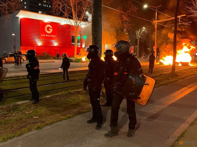 Paris police, protesters clash for third night over Macron's pension reform Paris police, protesters clash for third night over Macron's pension reform