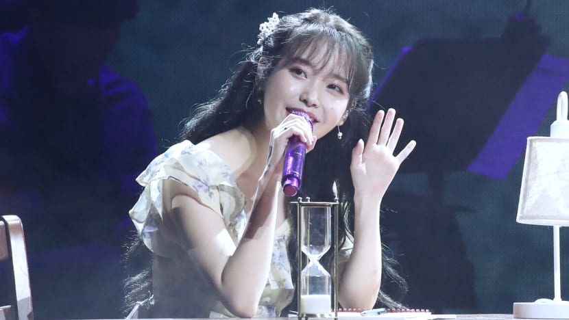 IU promises her fans that she will continue living her life well