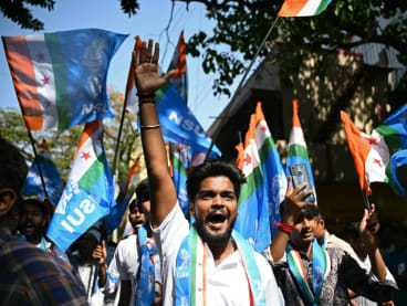 Members of the National Students' Union of India gather during a roadshow by the chief minister of Karnataka state Siddaramaiah as part of the Indian National Congress party campaign in Bengaluru on April 7, 2024, ahead of tthe country's upcoming general elections.