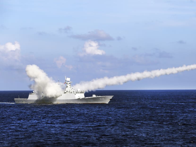 A Chinese missile frigate launches an anti-ship missile during a military exercise in the waters near south China's Hainan Island. Photo: Xinhua via AP