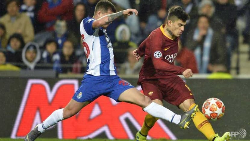 Football: Telles penalty edges Porto past Roma in extra time