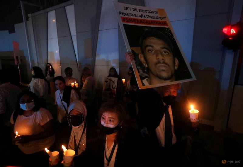 People taking part in a vigil ahead of the execution of Malaysian drug trafficker, Nagaenthran Dharmalingam, outside Singapore High Commission in Kuala Lumpur, Malaysia on April 26, 2022. People taking part in a vigil ahead of the execution of Malaysian drug trafficker, Nagaenthran Dharmalingam, outside Singapore High Commission in Kuala Lumpur, Malaysia on April 26, 2022.