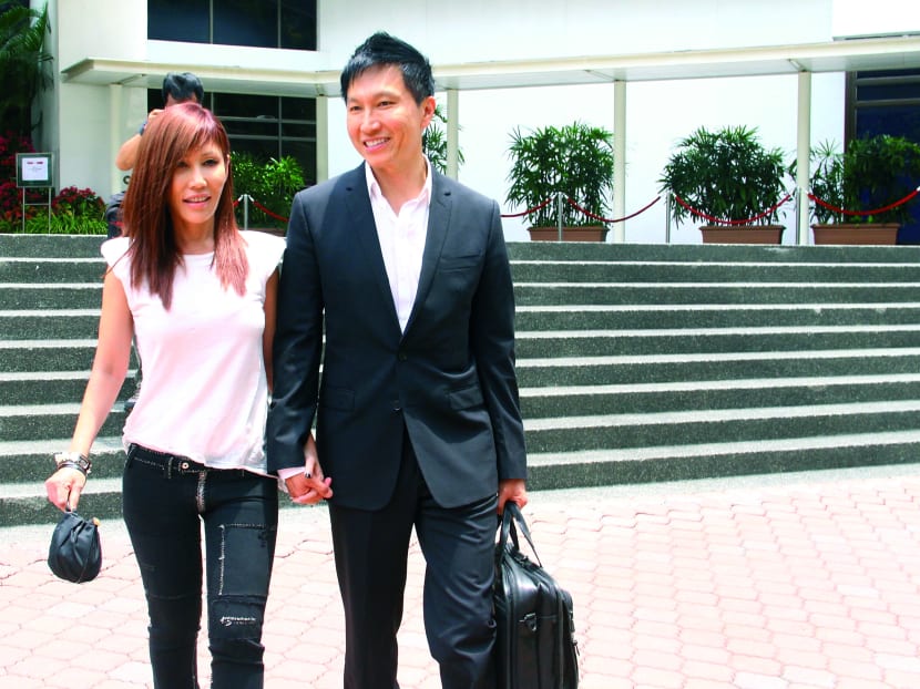City Harvest Church co-founder Kong Hee, who faces charges of criminal breach of trust and falsification of accounts, with his wife Ho Yeow Sun yesterday. Photo: Ernest Chua