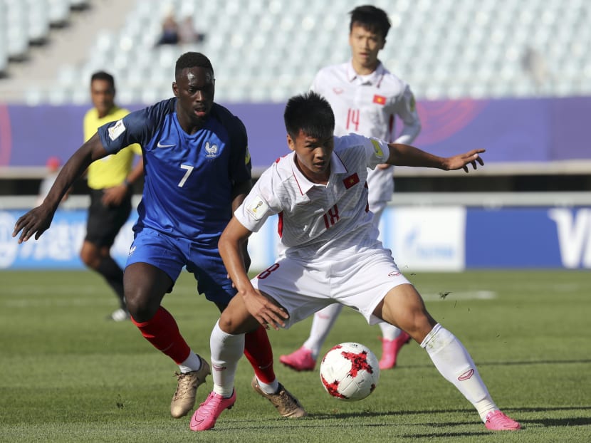 Vietnam's Van Hao Duong shielding the ball from France's Jean-Kevin Augustin 
during their Group E match in the FIFA U-20 World Cup Korea 2017 in Cheonan, South Korea. Photo:  AP