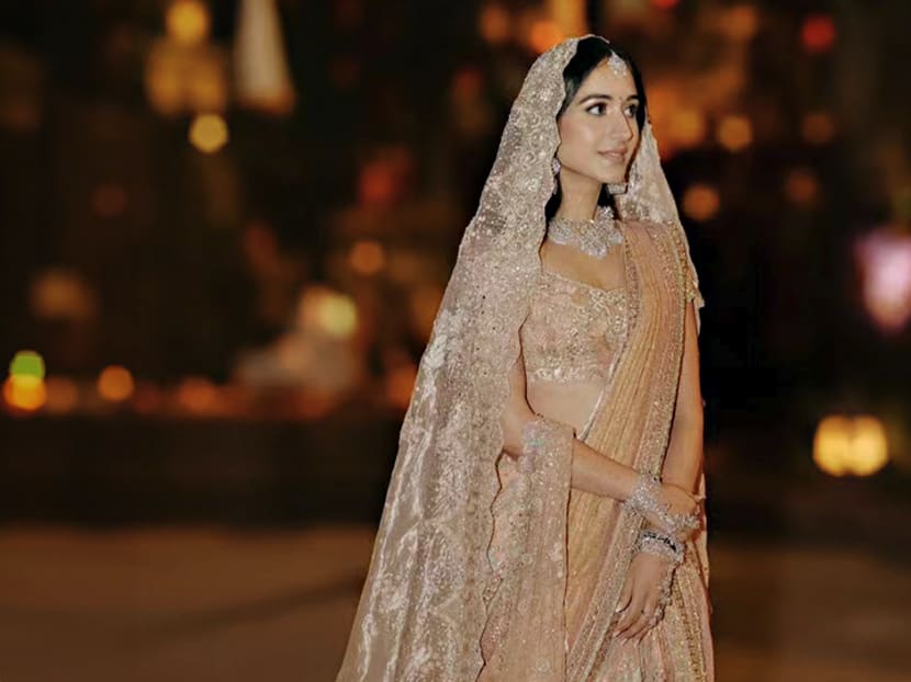 A look at Radhika Merchant s outfits for the Ambani pre wedding