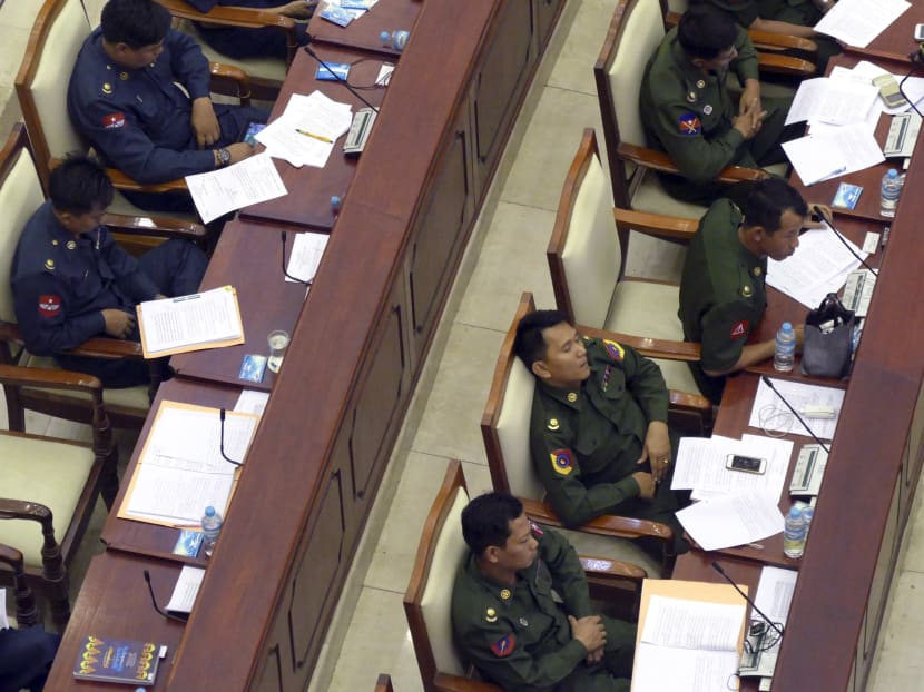 In this photo taken on April 9,2015, an army representative is seen dozing off at a parliament session in the country’s administrative capital of Naypyitaw, Myanmar. Photo: AP