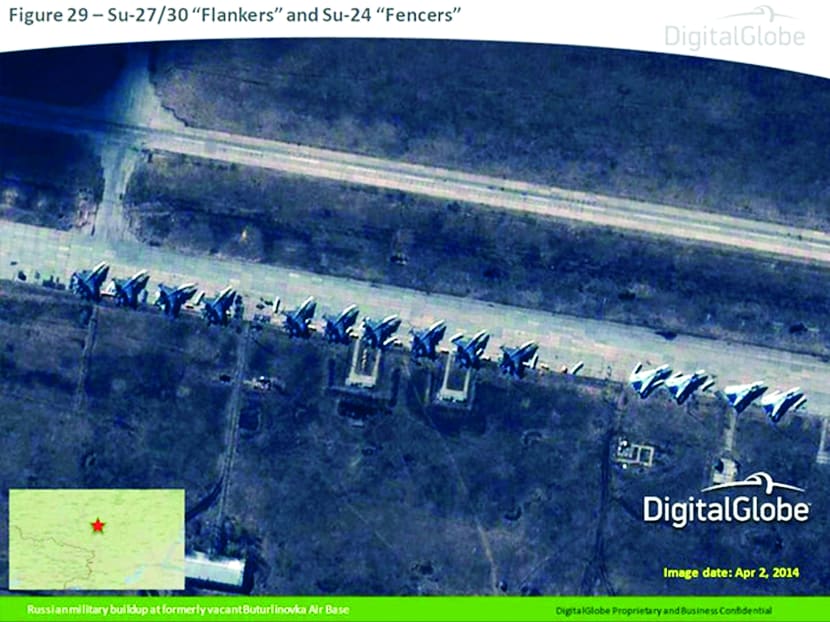 A satellite image  from the Supreme Headquarters Allied Powers Europe (SHAPE) and taken by DigitalGlobe on April 2 shows what is reported by SHAPE to be Russian Su-27/30 Flankers and Su-24 Fencers at a military base in Buturlinovka, southern Russia.
Photo: Reuters