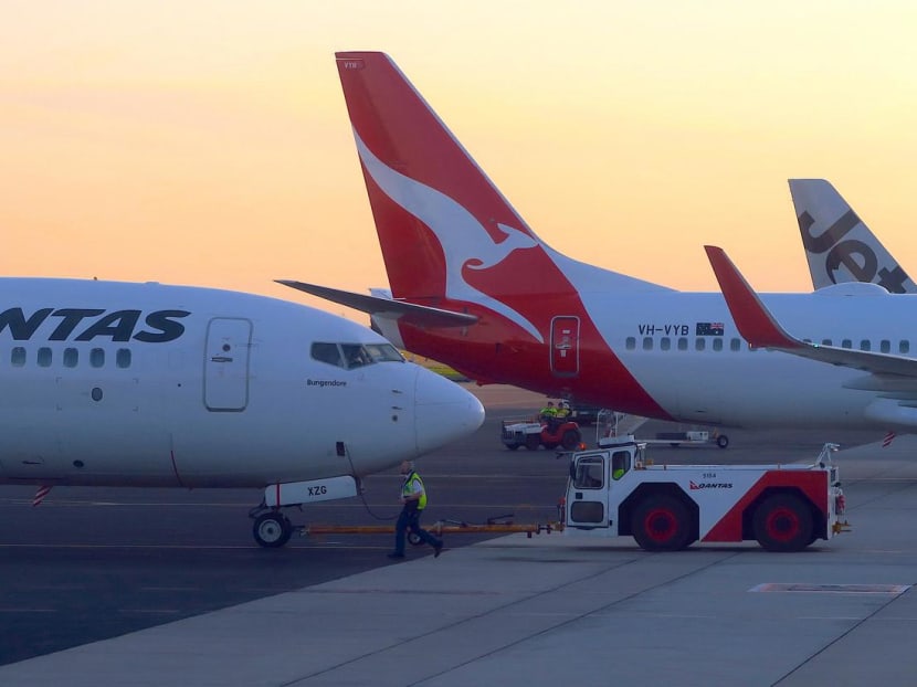 Qantas reported a "strong first half of the year" followed by "a near-total collapse in travel demand" as virus restrictions were introduced.