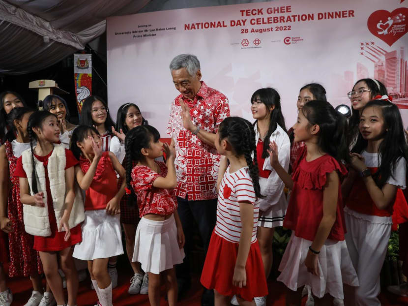Prime Minister Lee Hsien Loong with performers at the Teck Ghee National Day Celebration Dinner at Teck Ghee Community Club on Aug 28, 2022.