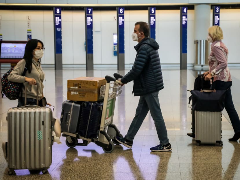 A file photo of travellers at Hong Kong International Airport. A file photo of travellers at Hong Kong International Airport.