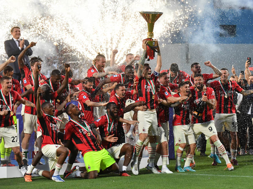 AC Milan players celebrate after the "Scudetto" championship on May 22, 2022.