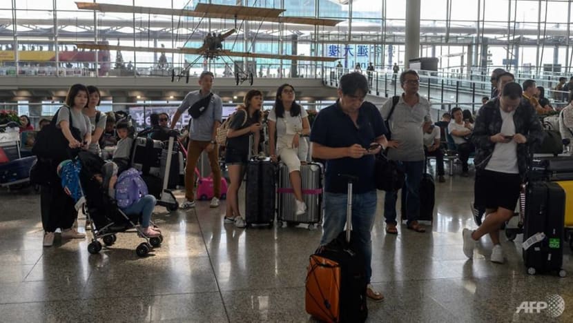Hong Kong airport reopens but hundreds of flights cancelled, more protests planned Hong Kong airport reopens but hundreds of flights cancelled, more protests planned