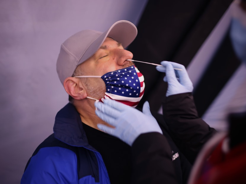 A man gets tested for Covid-19 at a mobile test site being run by Roseland Community Hospital on Dec 12, 2020 in Chicago, Illinois. A man gets tested for Covid-19 at a mobile test site being run by Roseland Community Hospital on Dec 12, 2020 in Chicago, Illinois.