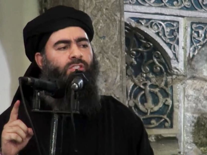 This file image made from video posted on a militant website on Saturday, July 5, 2014, purports to show the leader of the Islamic State group, Abu Bakr Baghdadi, delivering a sermon at a mosque in Iraq during his first public appearance. Photo: AP