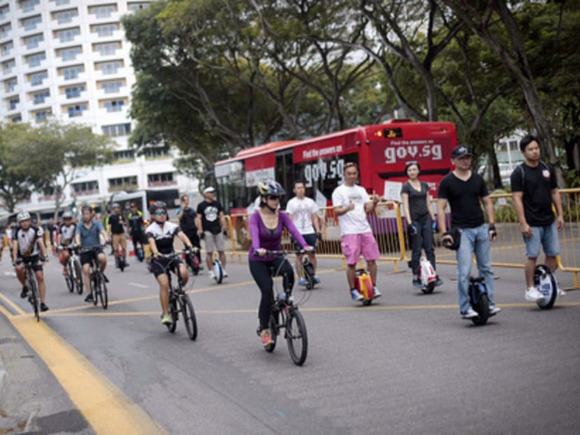 Personal mobility devices were allowed in the second edition of car-free Sunday held yesterday. Some second-timers, however, noticed fewer participants. PHOTO: JASON QUAH