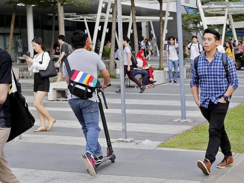 An e-scooter rider spotted outside One North MRT Station. TODAY file photo
