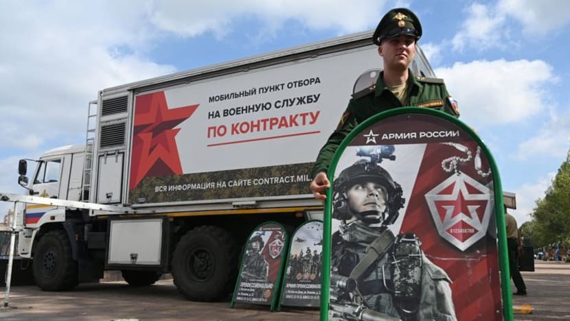 Russia turns to recruiting trucks, big wages to woo volunteer soldiers Russia turns to recruiting trucks, big wages to woo volunteer soldiers
