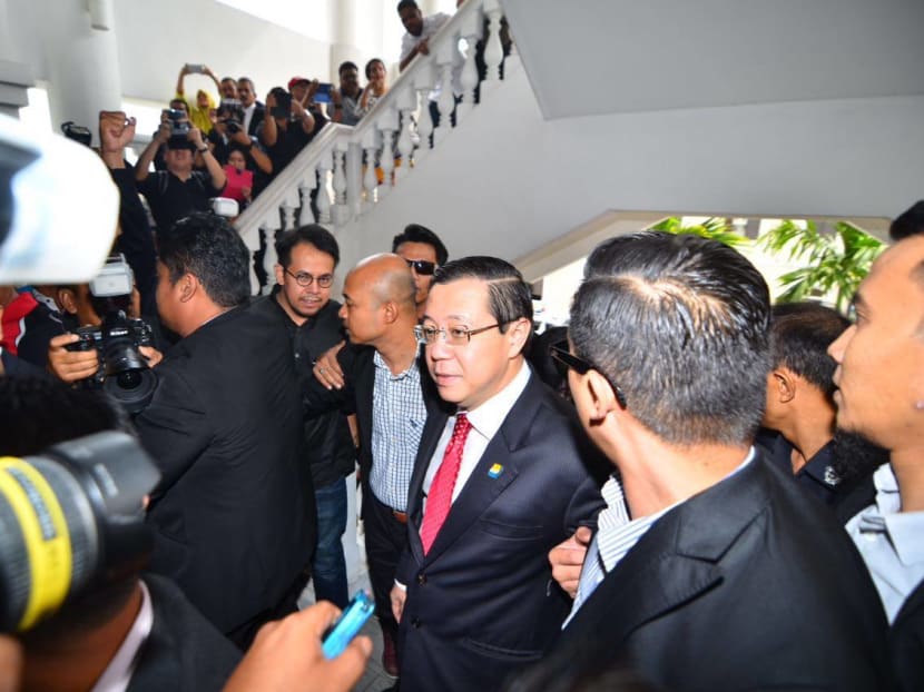 Penang Chief Minister Lim Guan Eng, centre, outside court on June 30, 2016. Photo: Lim Guan Eng's Facebook page