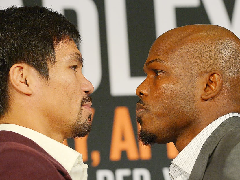 Manny Pacquiao and Timothy Bradley, Jr face off during a press conference at the Beverly Hills Hotel to announce their upcoming boxing fight. Photo: Reuters