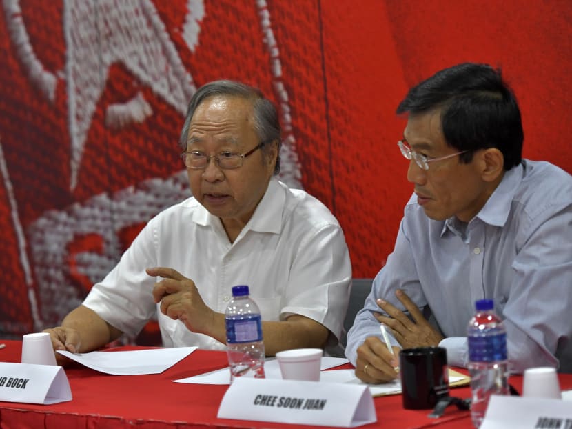 Singapore Democratic Party’s secretary-general Chee Soon Juan (right) proposed for Dr Tan Cheng Bock (left) to lead the opposition coalition, at a meeting in July 2018.