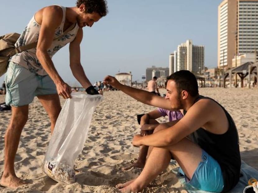 For Israeli cigarette butt collector, every day is Earth Day For Israeli cigarette butt collector, every day is Earth Day