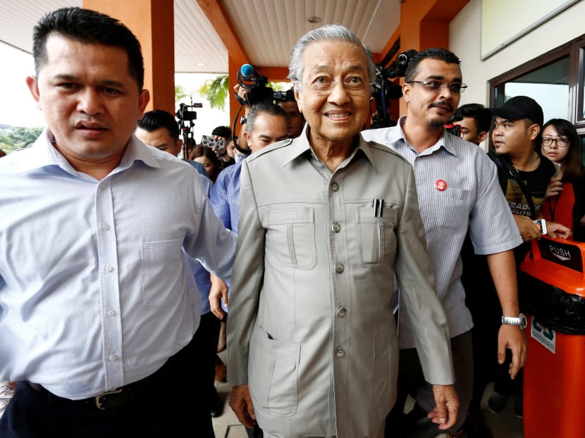 Former Malaysian Prime Minister Mahathir Mohamad arrives to visit jailed opposition leader Anwar Ibrahim who is recuperating from a surgery at Cheras Rehabilitation Hospital in Kuala Lumpur on Jan 10. It seems clear that the opposition is gunning strongly for the crucial Malay vote, riding on the wave of the Anwar-Mahathir partnership. Photo: Reuters