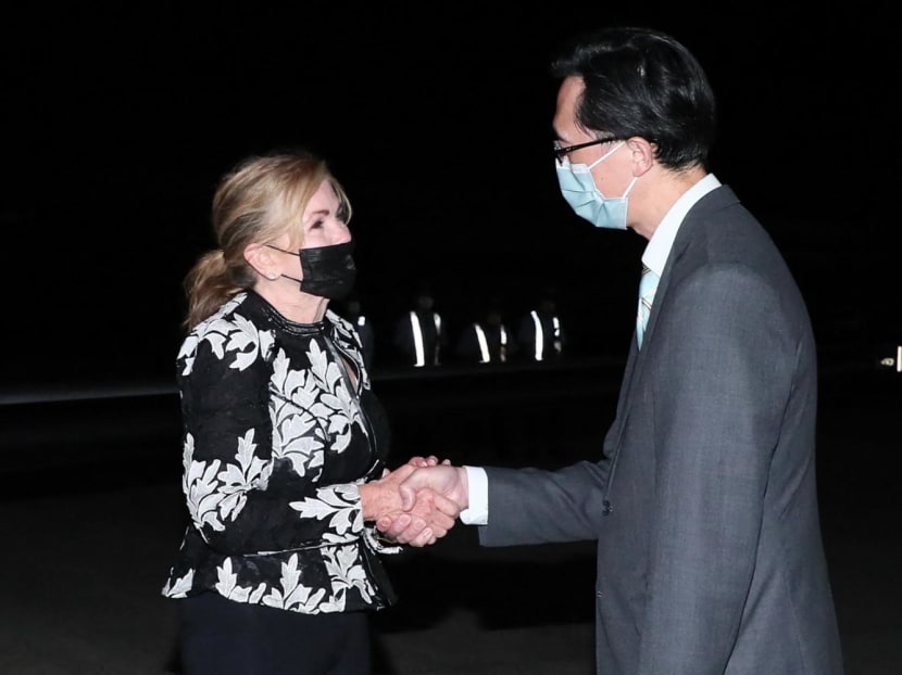 Handout picture taken and released by Aug 25, 2022 showing US Senator Marsha Blackburn (left) being greeted by a Taiwanese official upon her arrival at the Sungshan Airport in Taipei.